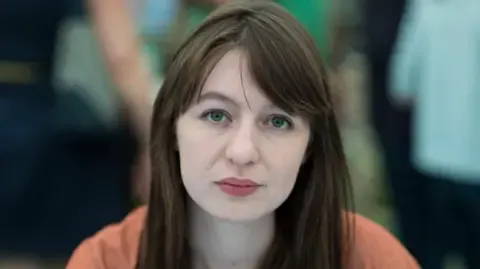 Irish author Sally Rooney declares she is unable to enter the UK due to arrest fears