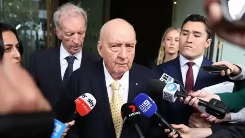 Sexual Assault Accusations Against Top Australian Media Personality Reduced